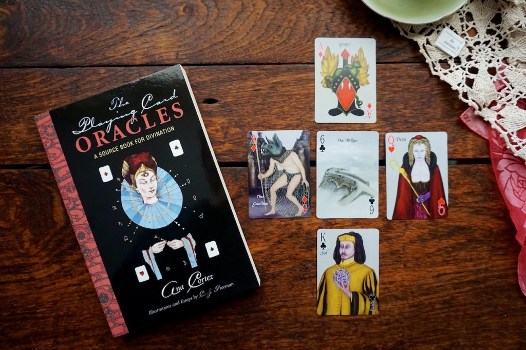 Playing Card Oracles Book with Alchemy Edition Deck which are playing cards for card reading and cartomancy by CJ Freeman and Ana Cortez